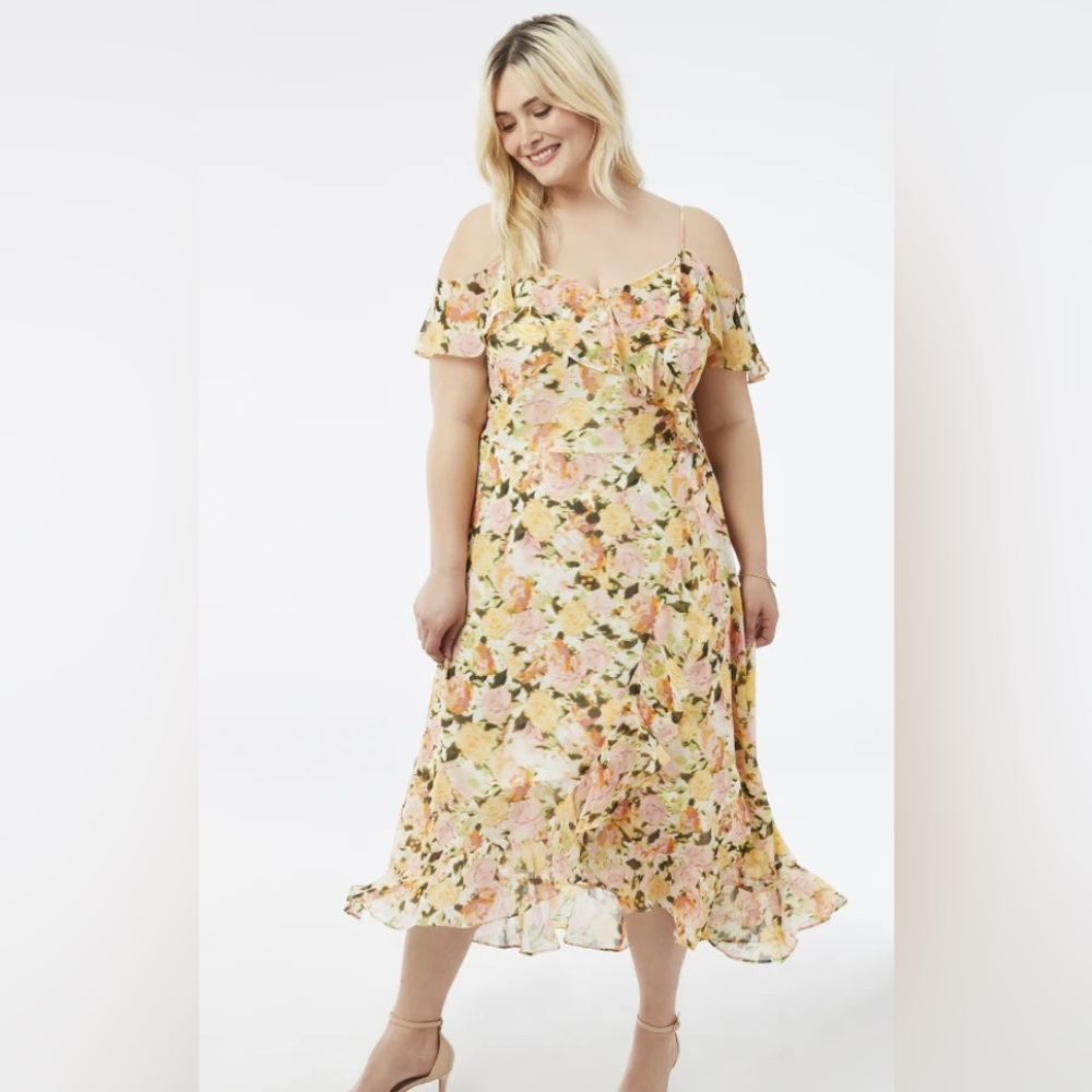 NWT. Adorne floral dress.  Ruffled hem and flutter details on cold shoulder top.
